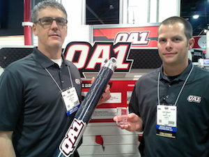 Travis Gorsuch, QA1’s Director of Advanced Materials (L) and QA1's Dave Knauff (R) pose with the company's SEMA award winning carbon fiber driveshaft.