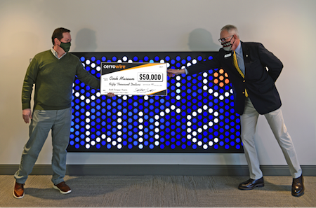 (L to R) Cerrowire President Stewart Smallwood presents a check for $50,000 to Cook Museum Executive Director Scott Mayo.