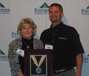 The Evergreen Marketing Group's Preferred Supplier Member company of the Year (Tier 2) is the Relton Corporation, Arcadia, CA. Shown L-R are Darcey Arena and Patrick Kearl. Acm