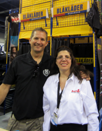 Blaklader president Marcus Carlberg (L) enjoys a busy show and gets a helping hand in his booth from STAFDA distributor Maria Polidoro of ACE Tool Repair of Wantagh, NY.