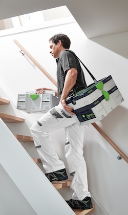 The Festool CT SYS has tool-triggered operation, high performance suction, self-contained hose and cord storage and is designed to be carried via an integrated handle, or worn over the shoulder using an included shoulder strap. 
