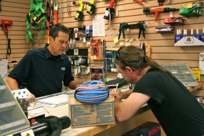 Southwest's showroom customer service manager Rick Belanger (L) works with a customer.