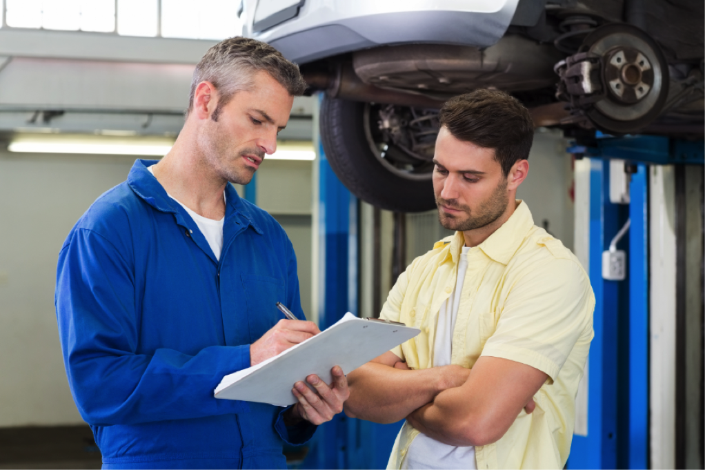 Sam had the mechanic service his car. Mechanic and customer. Mechanics Team. Auto Mechanic standing with his back PNG.