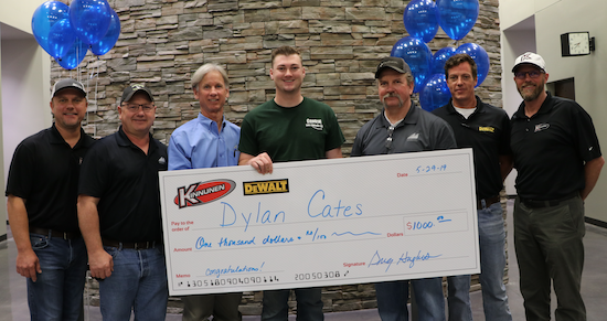 Meridian Technology Center Instructors, as well as Kinnunen Sales and Rental and DeWALT representatives celebrate with Meridian student Dylan Cates (center), who will receive $1,000 to use toward tools at Kinnunen to start his career.