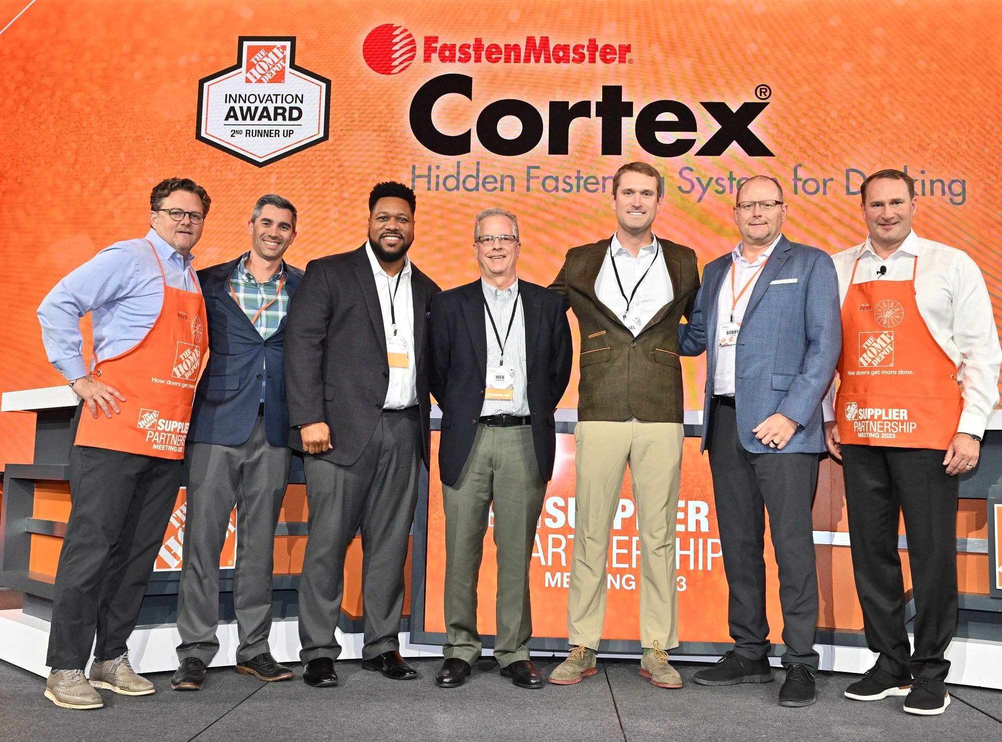 Pictured (L to R): Billy Bastek- Senior Vice President of Merchandising- The Home Depot; Scott Moore- Sr. Merchant- The Home Depot; Peyton Brown- Director of Key Accounts- FastenMaster; Web Shaffer- Senior Vice President and General Manager- FastenMaster; Mikael Cook- Key Account Manager- FastenMaster; Bobby Baylis- Merchandising Vice President- The Home Depot; Jeff Kinnaird- Executive Vice President of Merchandising- The Home Depot 