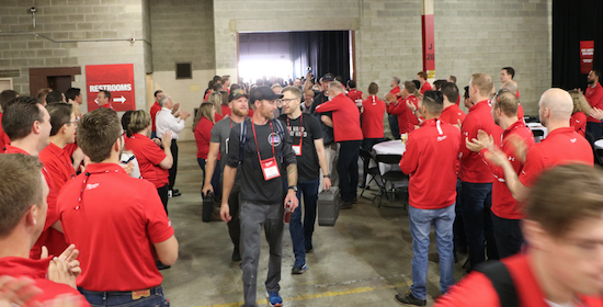 Milwaukee always gives guests a warm welcome. This gauntlet of cheers has become a tradition for journalists arriving at the annual New Product Symposium.