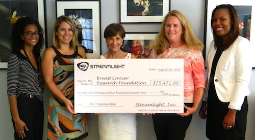 Streamlight Global Brand Manager Loring Grove (second from right) presents the company’s donation to representatives of The Breast Cancer Research Foundation.