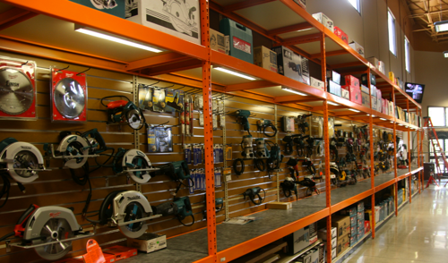 At Brinker Brown, cordless power tools are grouped and displayed by brand to reinforce their common battery pack/system sell nature, but corded power tools, like those on this wall, are grouped together by product category, so customers can easily compare one brand to another. 
