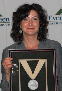 Tina Erpenbach takes home the Evergreen Marketing Group's Tier 2 Distributor of the Year award for her company, Northern States Supply of Willmar, MN