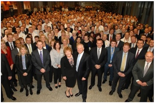 JCB CEO, Alan Blake (front, center) with his wife Diane at his retirement presentation. 	