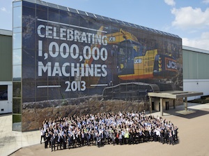 Employees celebrate the manufacture of JCB's one millionth machine in Staffordshire.