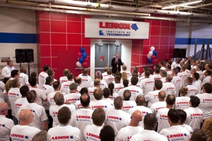 Rich Weurthele, the new president at LENOX, welcomes staff at the ribbon cutting ceremony of the new LENOX Institute of Tehcnology, on June 7th.