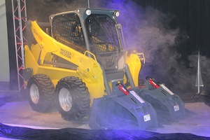 Fog machine not included: Wacker Neuson unveiled its new skid steer line at its second annual dealer summit at the company’s North American manufacturing facility and corporate headquarters in Menomonee Falls, Wisconsin, October 1-3, 2013. 