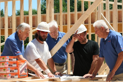 The Chester brothers still take time to meet customers and observe how their Pneu-Fast nail products are being used on the jobsite.