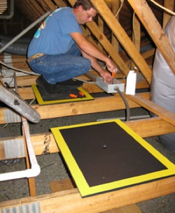 Attic-Trax Walkboards allow workers to move safely through an attic space and provide a stable standing surface.
